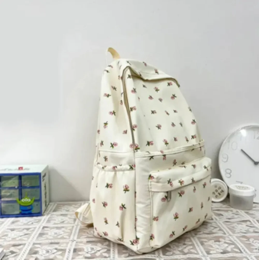 Cute floral backpack with a soft pastel vibe - perfect for everyday use