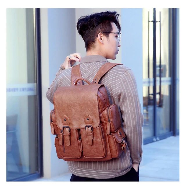 Genuine Solid PU Leather Large Capacity Backpack For Unisex Casual PU Leather Bag For Travelling And Official Purpose